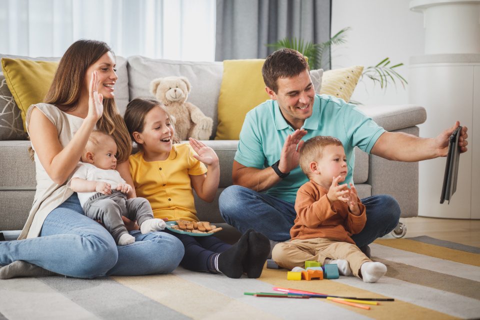 A family playing together in the living room
